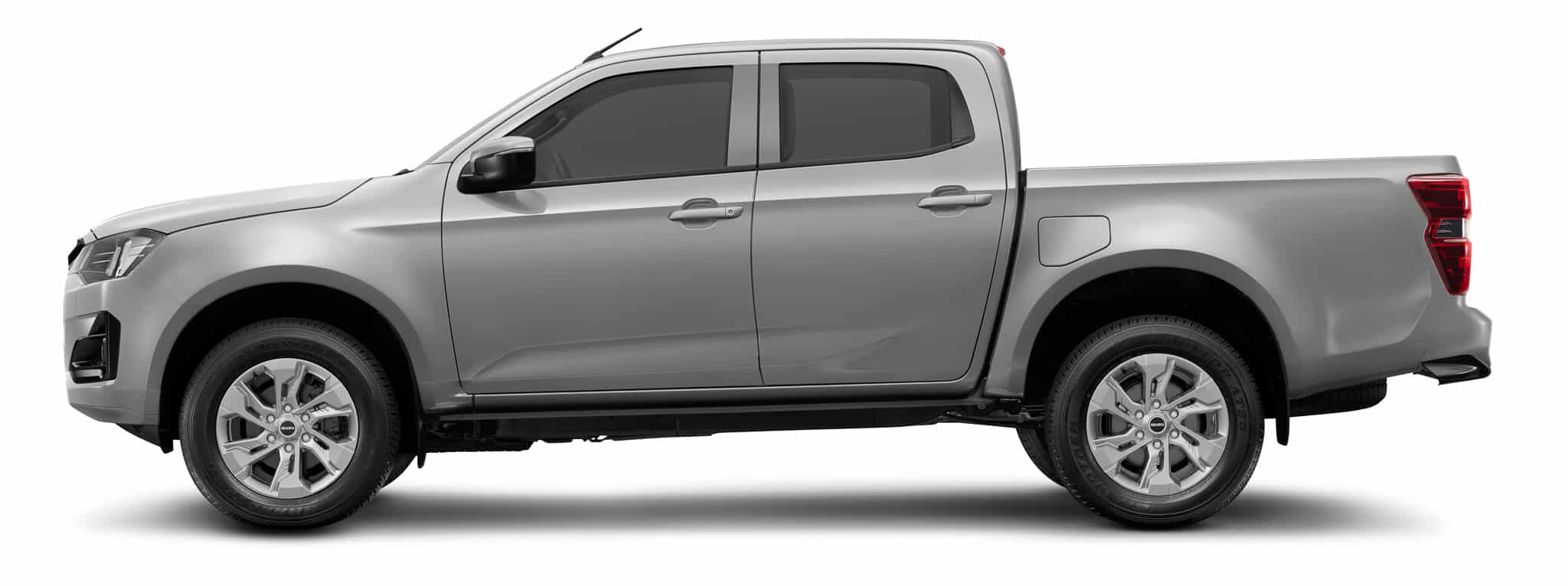 Isuzu D-Max argenté, pick-up double cabine profil jantes alliage, fond blanc.
