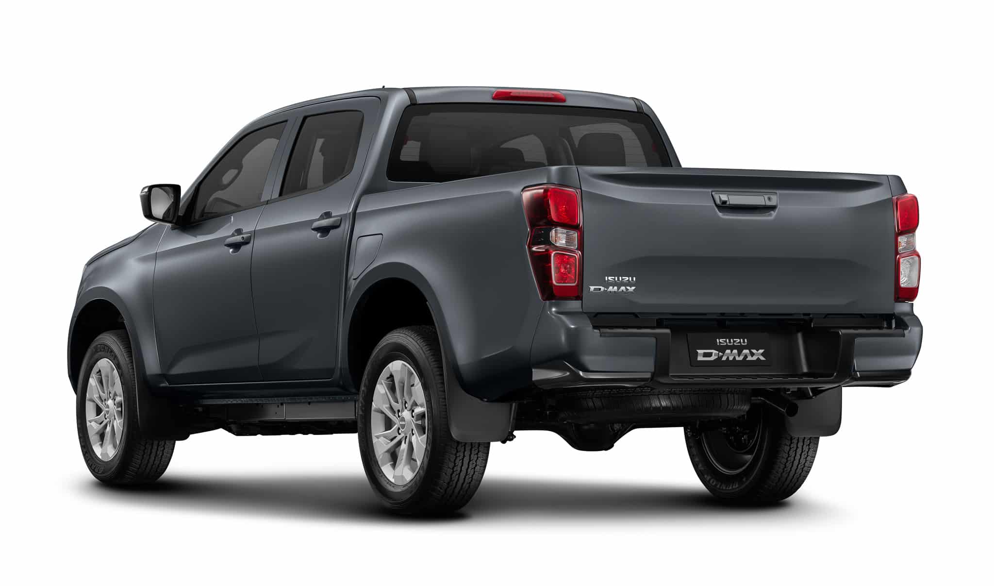 Isuzu D-Max gris foncé, vue arrière trois-quarts. Marquage ISUZU D-MAX visible sur fond blanc.