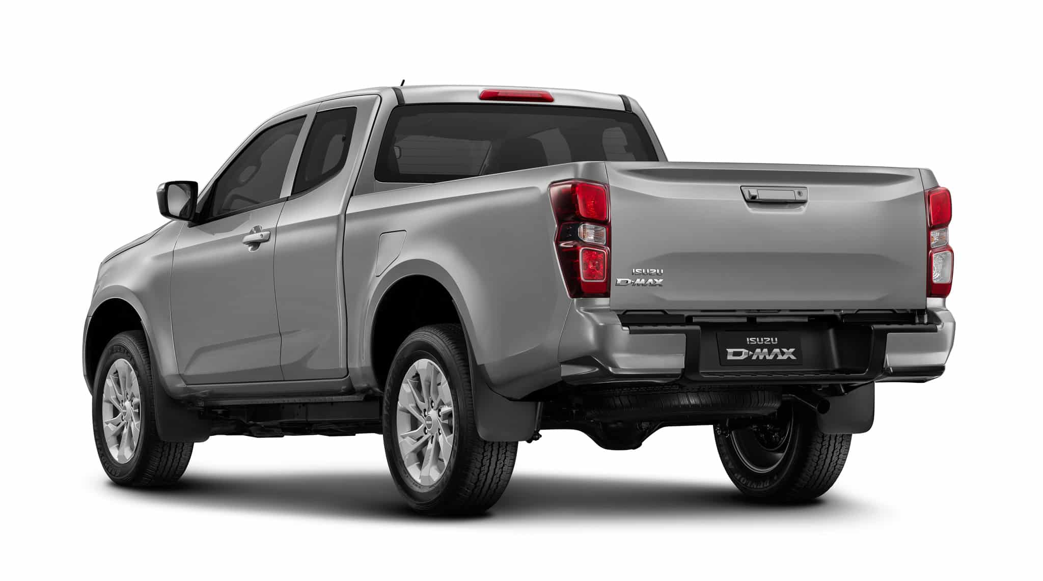 Isuzu D-MAX gris argenté, vue arrière trois-quarts montrant la benne et les feux sur fond blanc.
