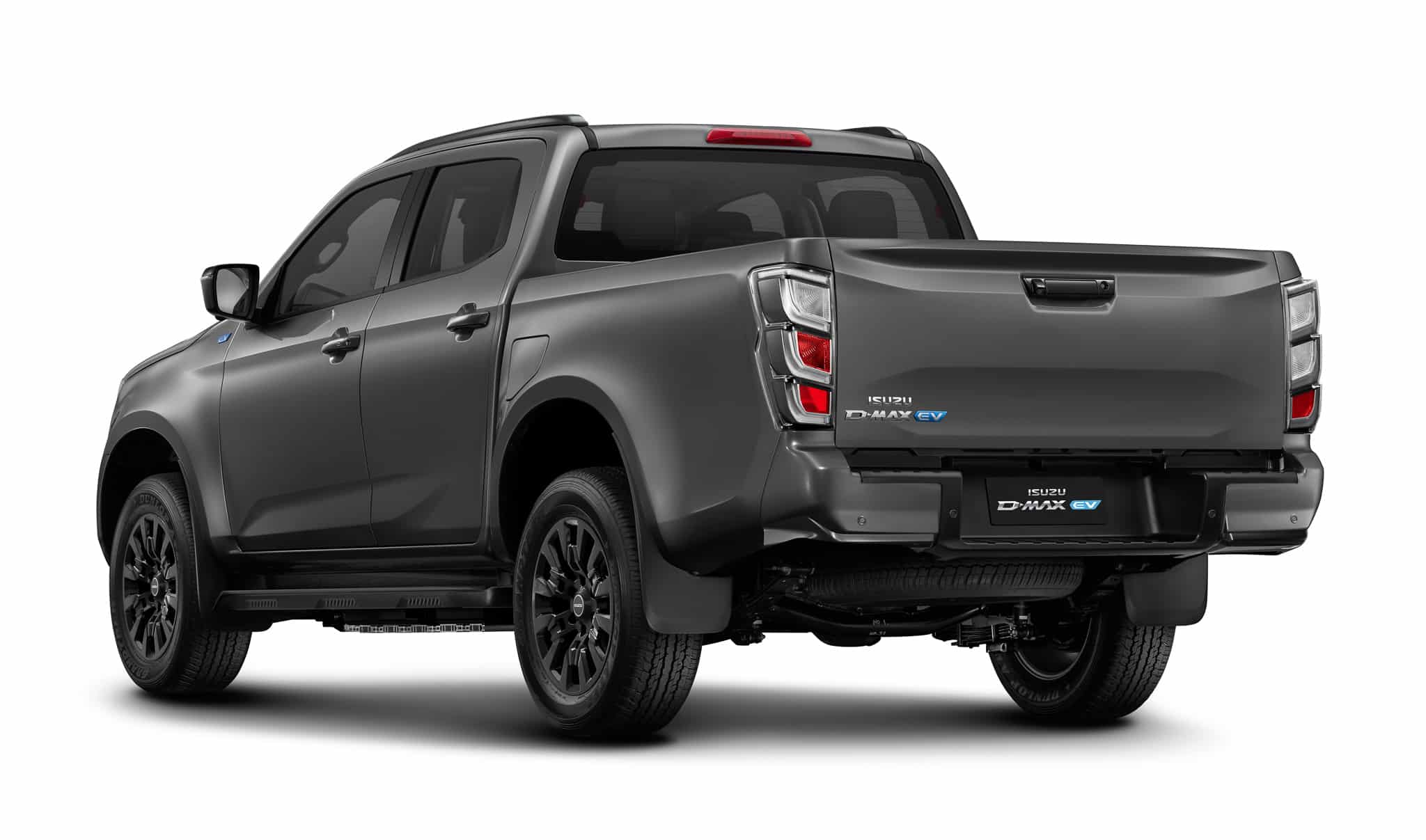 Pickup Isuzu D-MAX EV gris foncé, vue arrière avec jantes noires sur fond blanc.