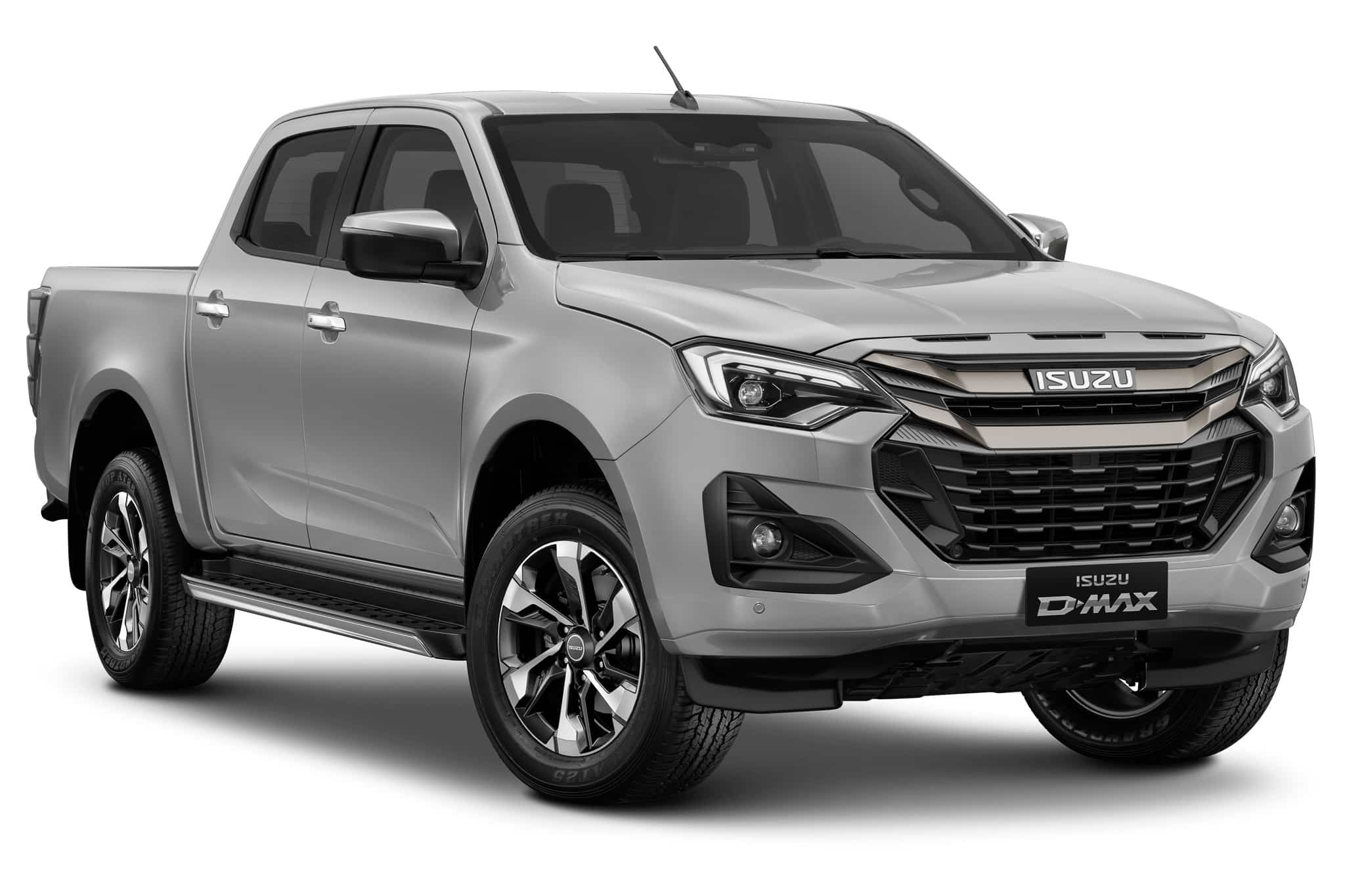 Isuzu D-Max argenté, pick-up double cabine robuste avec jantes alliage et calandre imposante.